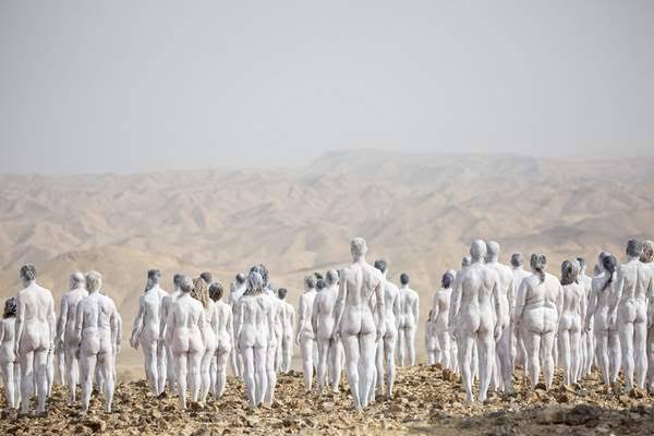 300 people pose nude at dead sea