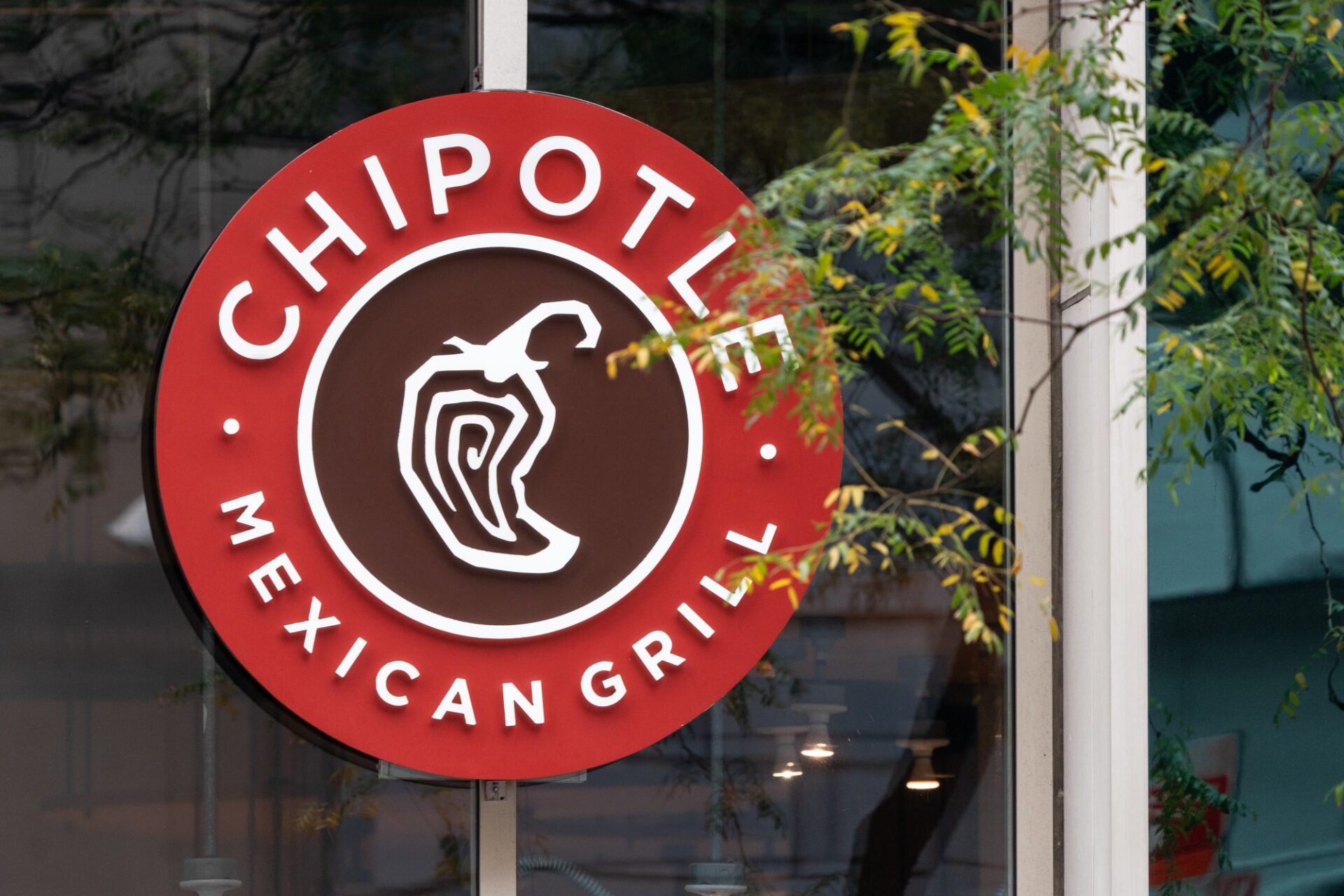 Chipotle agrees to pay ex-employees after closing store that tried to unionize