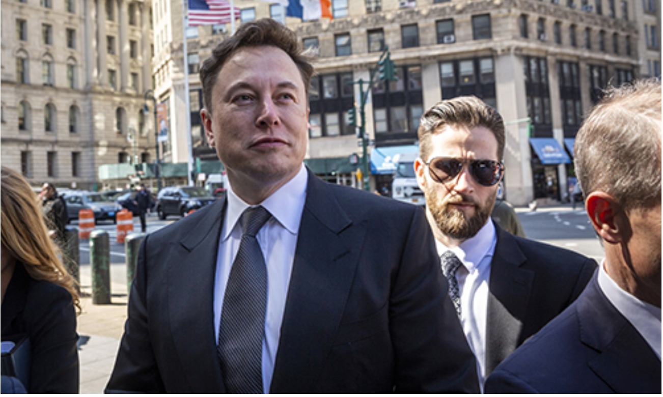 At Least Two Security Accompany Elon Musk Around Twitter Hq — Even To