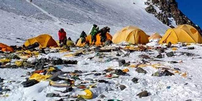 Mount Everest's highest camp filled with tons of frozen garbage that will take years to clean up