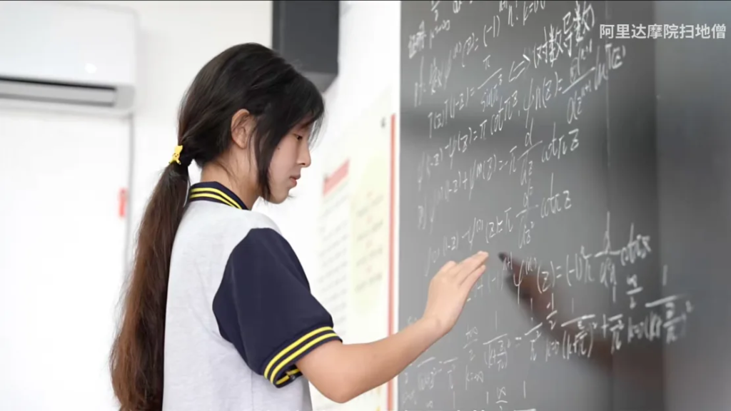 Jiang Ping: Rural Chinese fashion design student outscores Harvard and MIT students in a global math contest, sparking awe and skepticism