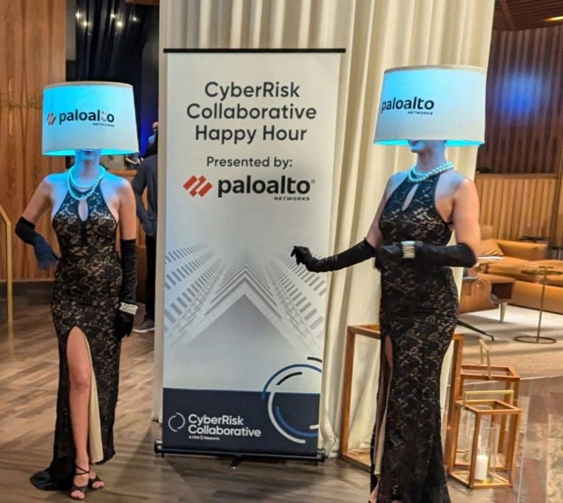 California-based cybersecurity firm faces backlash after 'sexist' hostess lampshade outfits photo goes viral