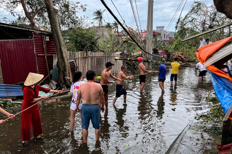 Thousands evacuated as floods sweep Vietnam following typhoon