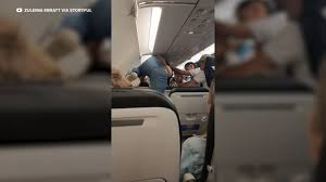 Watch: Passengers fear for their lives as tropical storm rocks plane mid-air