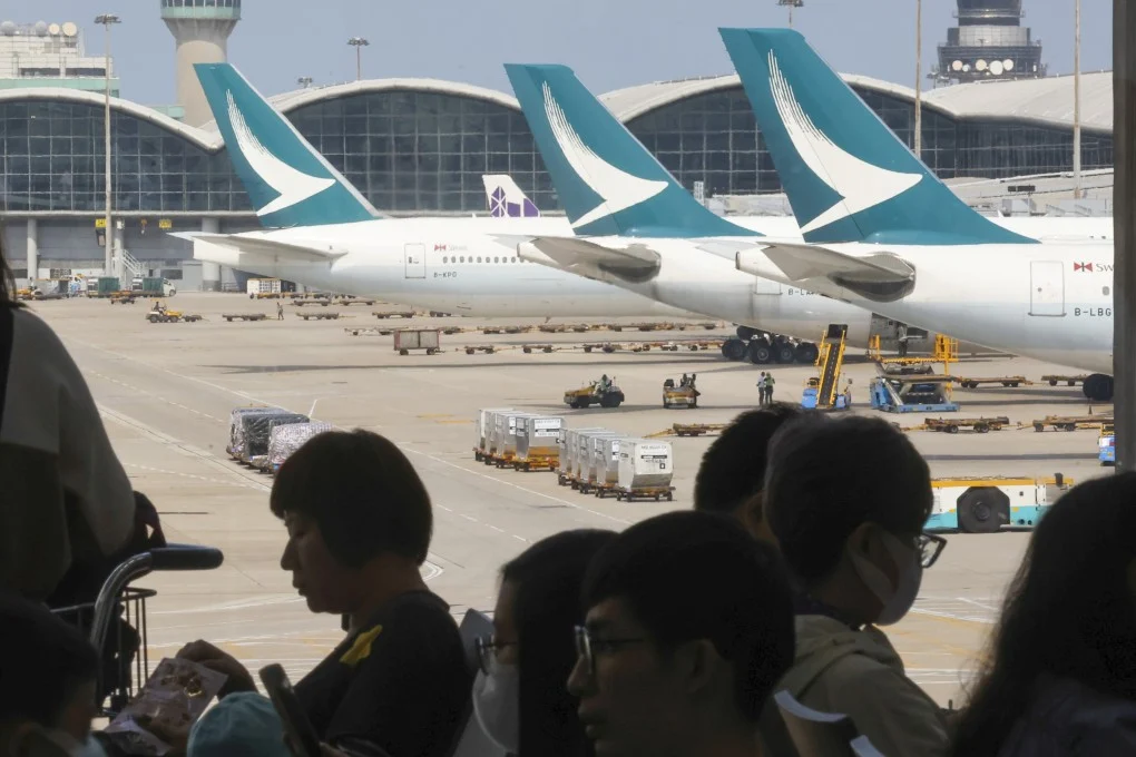 Watch: Cathay Pacific bans couple who kicked woman for reclining her chair