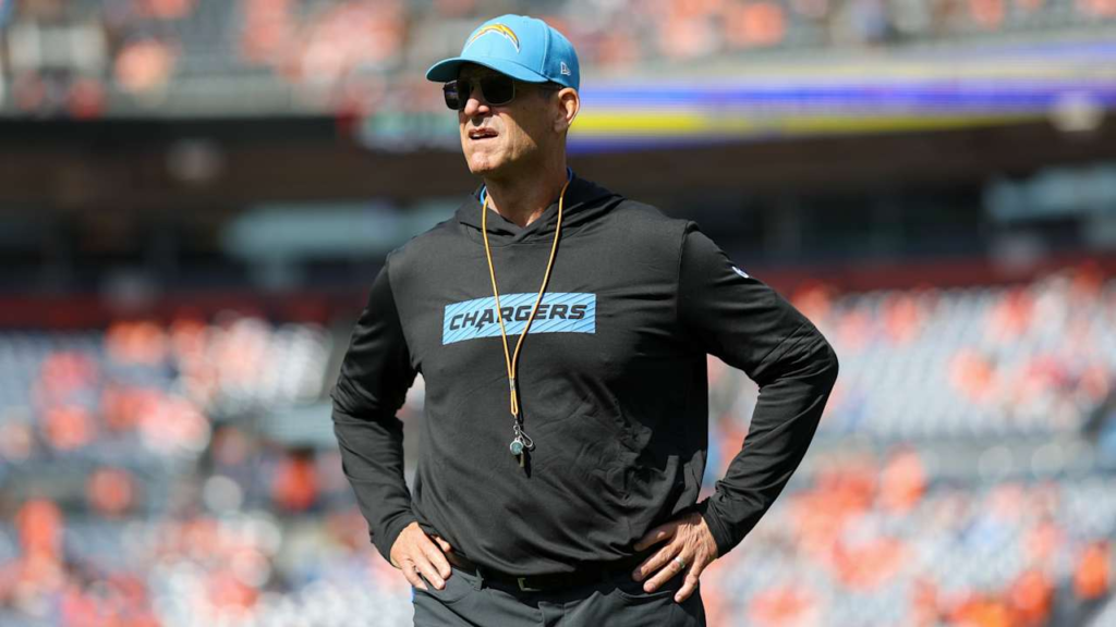 Chargers head coach Jim Harbaugh briefly left Sunday's game- Here's why