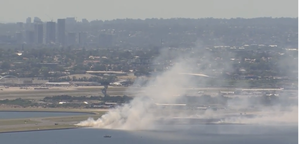 Watch: Qantas flight makes emergency landing due to engine failure on a Boeing 737, causes grassfire near runway