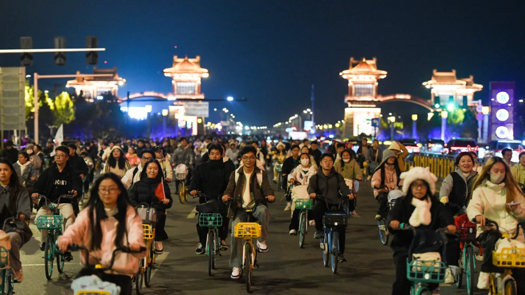 Chinese authorities on alert as thousands of college students cycle at night- Here's why