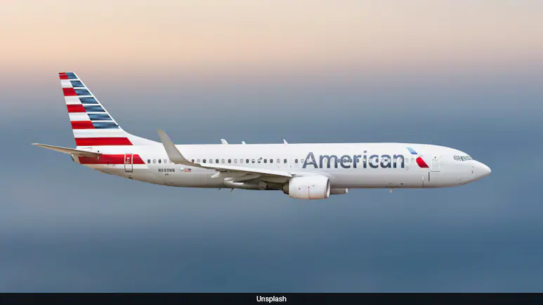 American Airlines passengers duct-tape man after he tries to open plane door mid-flight