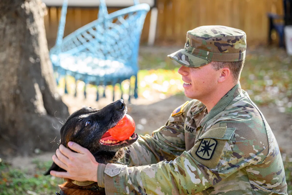 US Army soldier reunites with former K-9 partner after two years apart