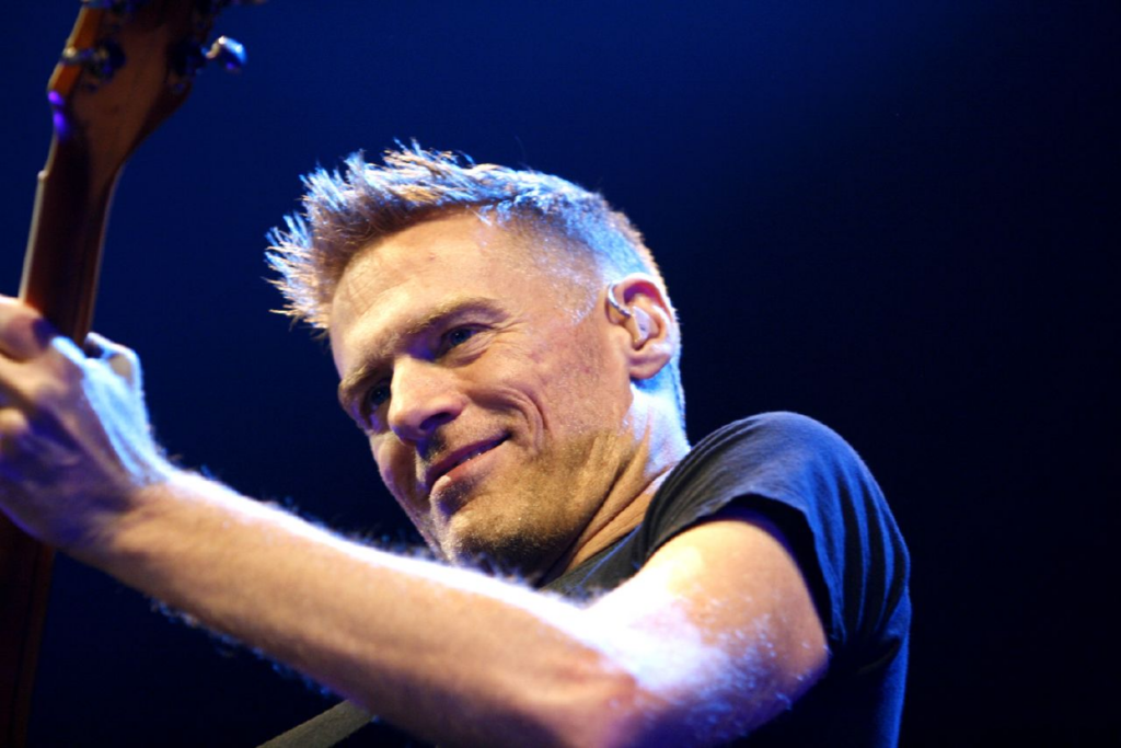 Rock Star Bryan Adams collaborates with chimpanzees for his latest masterpieces