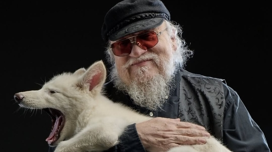 George RR Martin met the dire wolf pups. Photograph: (Facebook/ George RR Martin)
